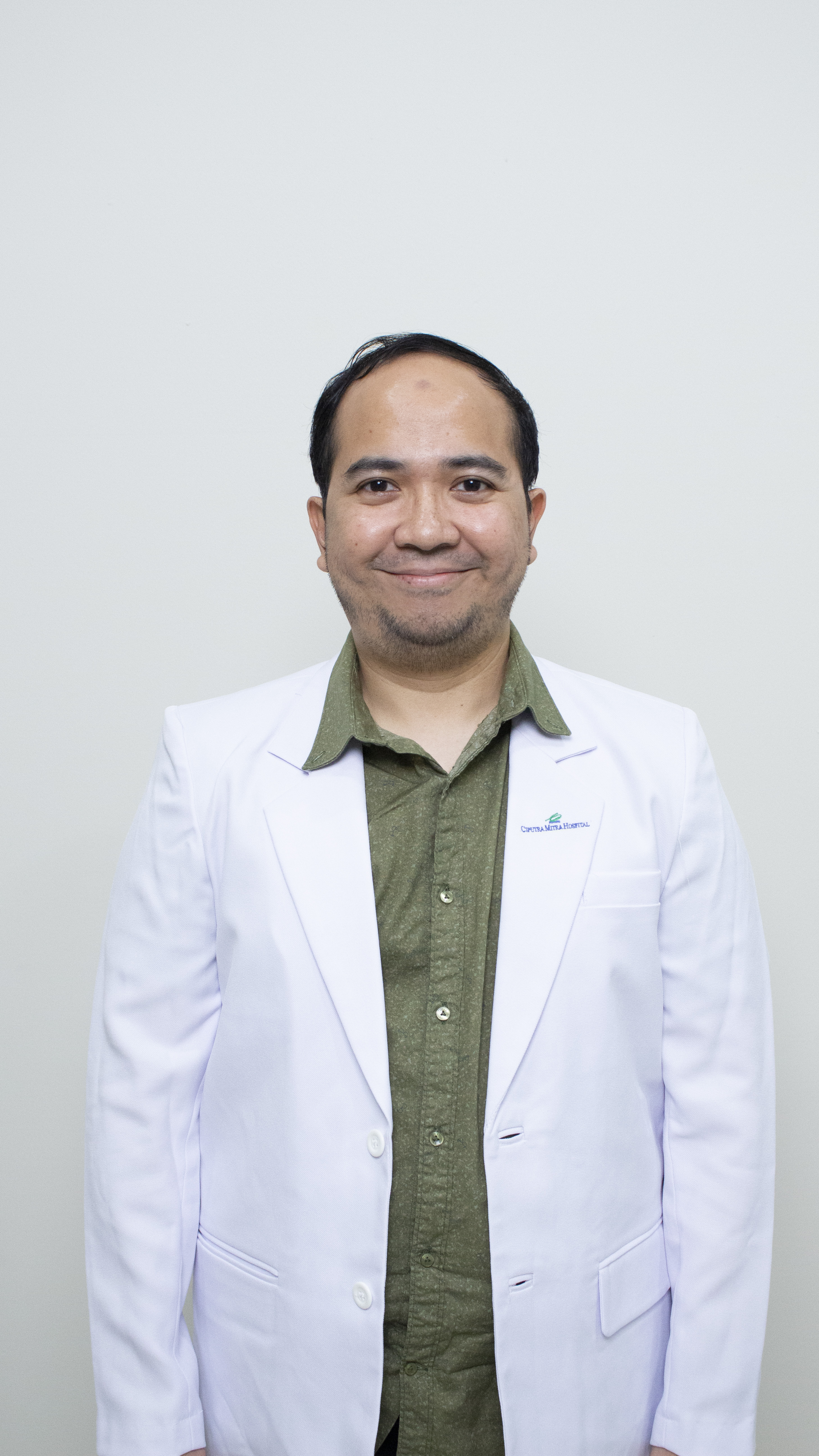 dr. Rizal Trianto, Sp.U.,FICS