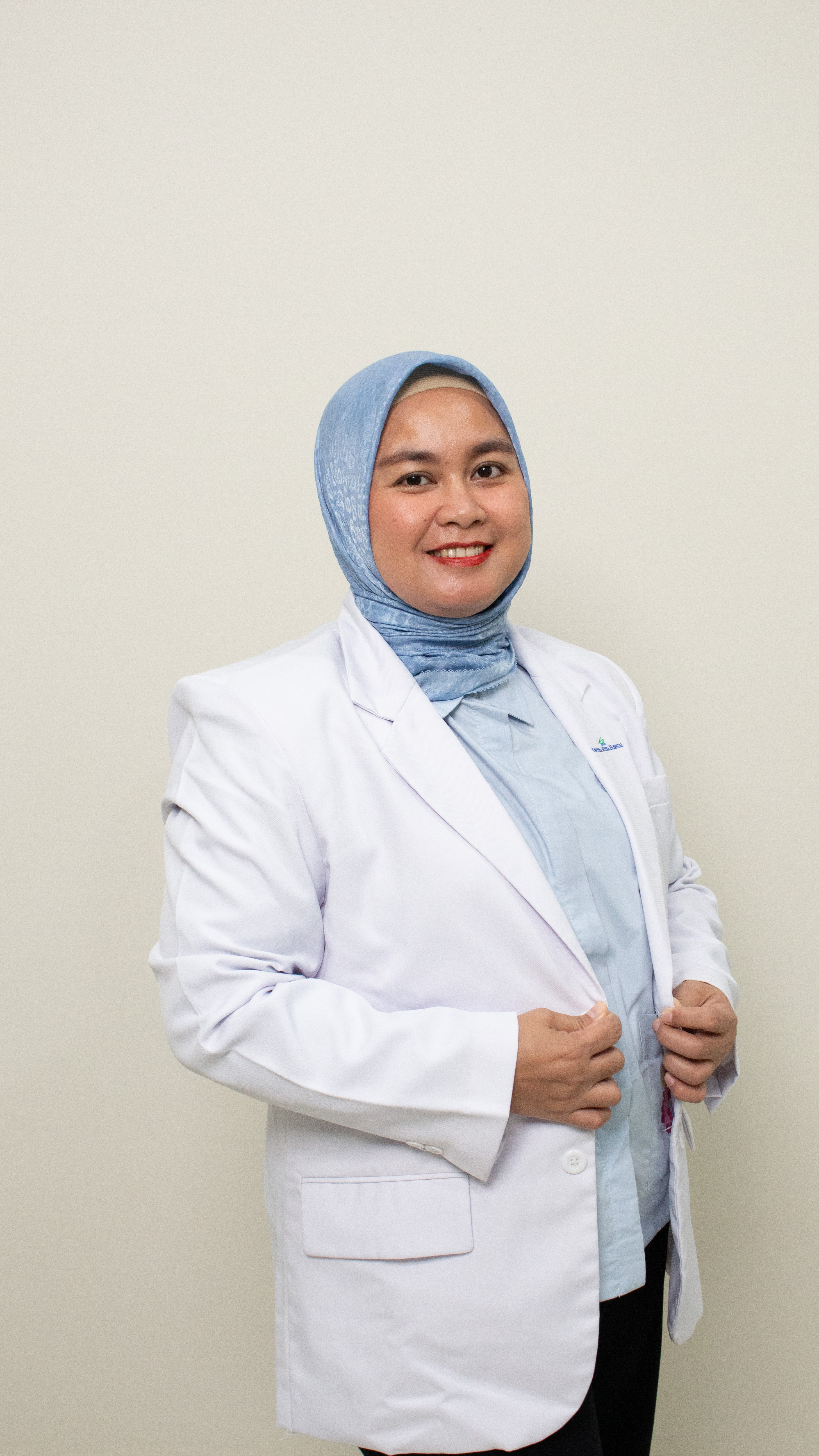 drg. Sherli Diana, Sp.KG