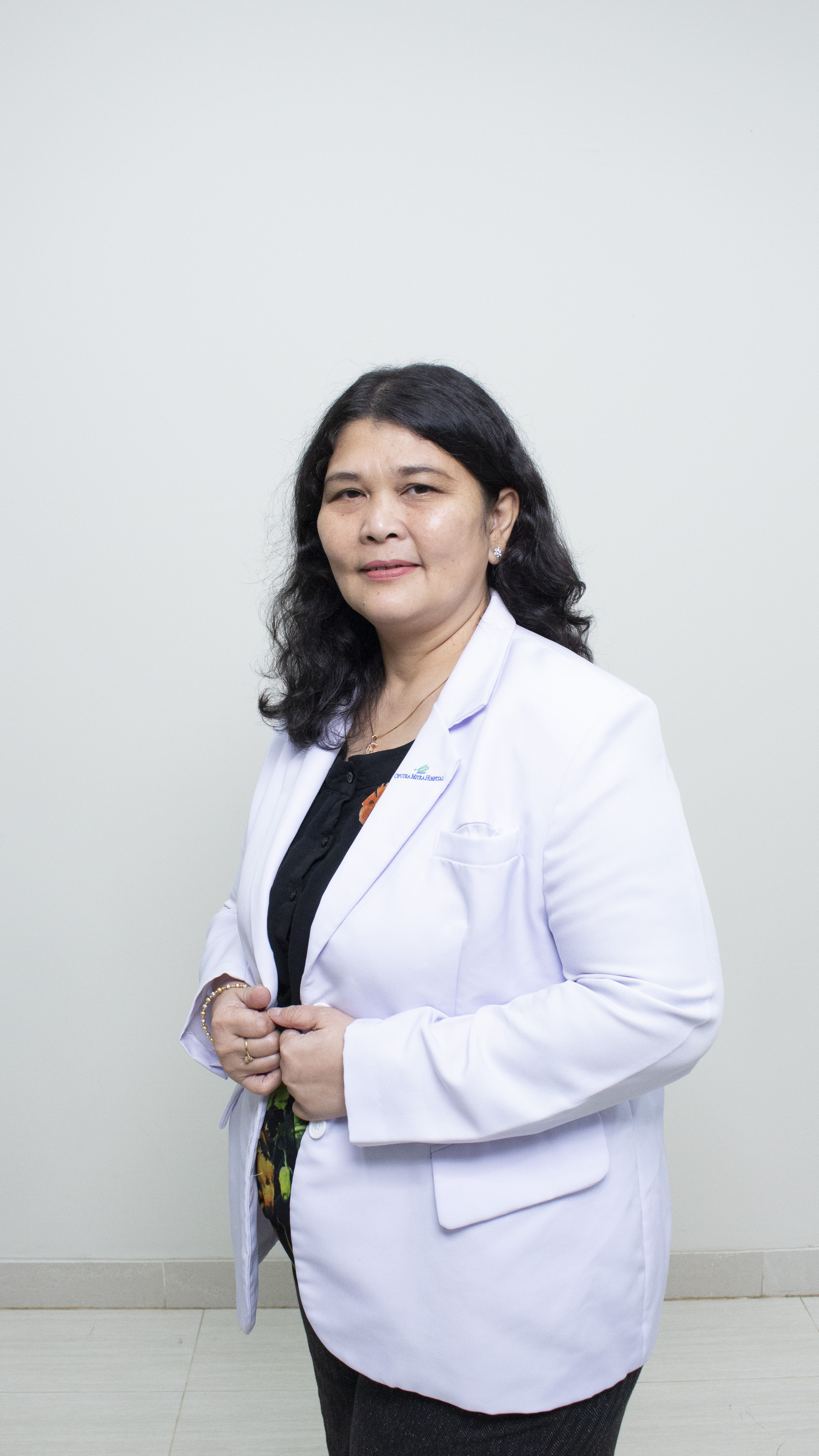 dr. Lita Dame N. T., Sp. KFR. M. S. (K) FIPM (USG)